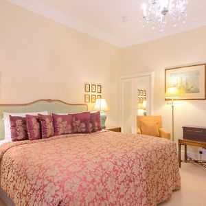 Kamer met een King Size Bed met de Toegang voor Gehandicapten